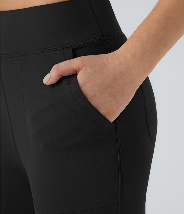 Women's Black Flared Pants With Front And Back Pockets.